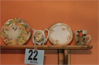 1 Creamer, 1 Cup, 2 Hand-Painted Plates, 1