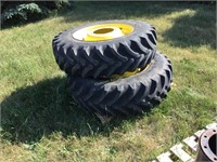Pair of Firestone 14.9 x 30 radial tires and rims