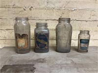 4 antique advertising jars