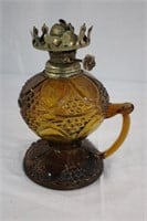 Amber glass figure base oil lamp 6.5"H