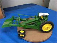 John Deere tractor w/loader, front wheels broke