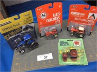 4 collectible tractors, 1/64 scale