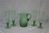 Green glass pitcher 8" and 4 pilsner glasses