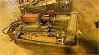 Wooden box of misc. hydraulic cylinders