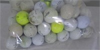 env.100 balles de golf
