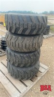 4 - 12-16.5 NHS Skid-Steer tires on rims