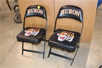 Pair of Black Huron Tiger padded chairs