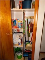 Contents of utility closet- cleaners, brooms,