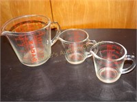 3 Pyrex glass measuring cups largest is 4c.