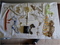 Costume jewelry- rosary's necklaces, etc.