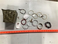 square metal container with bracelets