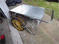 2 wheeled yard cart - 1 Broke crossbar underneath