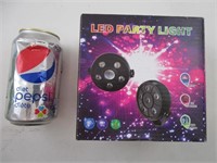 Une lampe électrique avec lasers colorés