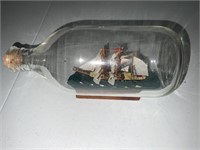 A ship in a bottle with stand