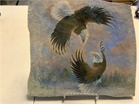 2 eagles painted on rocks with stand