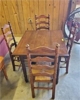 DINETTE TABLE AND 4 LADDER-BACK RUSH BOTTOM CHAIRS