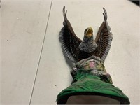 Eagle on rock figure