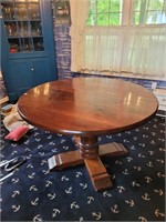 Round hardwood table 48w 30h with 2 leaves