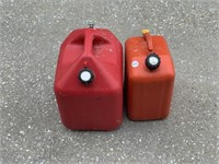 two gas cans one  5 gallon and one 2 1/2 gallon