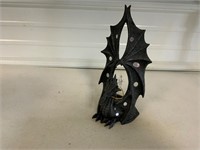 Dragon with mirrors on wings sculpture