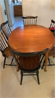 H.C. Co dining room table with 6 chairs and a