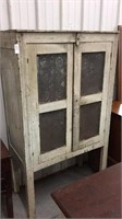 Punched tin jelly cabinet in original green paint