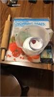 Rolling pin, measuring cup, chopping mats