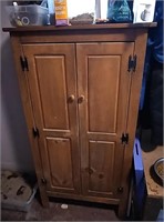 Wooden cabinet contents on inside are included