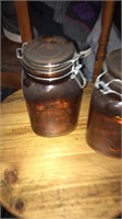 2 amber canisters