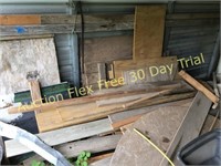 scrap plywood in carport south wall