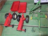 2 toy tractors, toy wagons and John Deere 1/16th