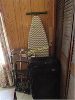 Ironing board, luggage, and walker