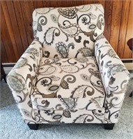 Paisley patterned arm chair with 2 pillows