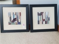 2 small black framed geometric prints