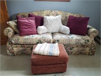 Floral sofa, 6 burgundy pillows , white reading