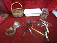Pottery dish, counter top bell, pens and more.