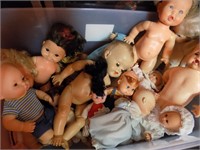 Tote of vintage dolls