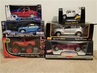 211- 4 Modern Die Cast Cars & 2 RC Toys