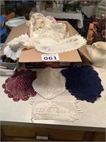 Box of mostly doilies