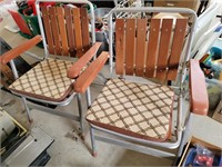Two aluminum folding chairs with pads great