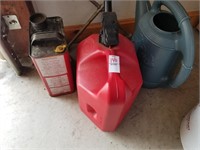 Watering can, gas can and surrounding
