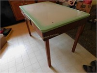 Enamel top kitchen table (40"L x 25"w x 28"h)