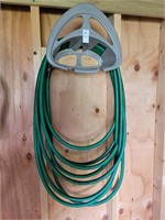Hose hanger with hose