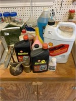 LOT OF OIL, TWO OIL CANS AND OTHER AUTO