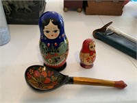 SMALL RUSSIAN NESTING DOLL AND LACQUERED SPOON