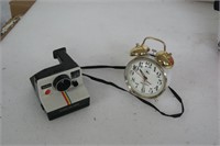 Polaroid Camera and Wind-Up Clock