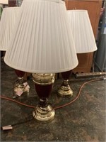 Three Matching red and brass table lamps