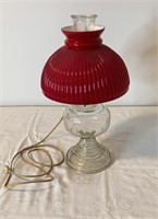 Antique hurricane lamp with red glass shade 18”