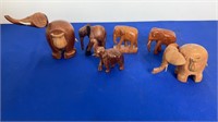 Box lot of wooden elephants