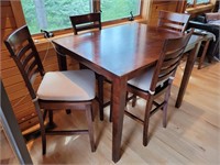 High table w/ chairs 3' t x 3' x 4' - stools are..